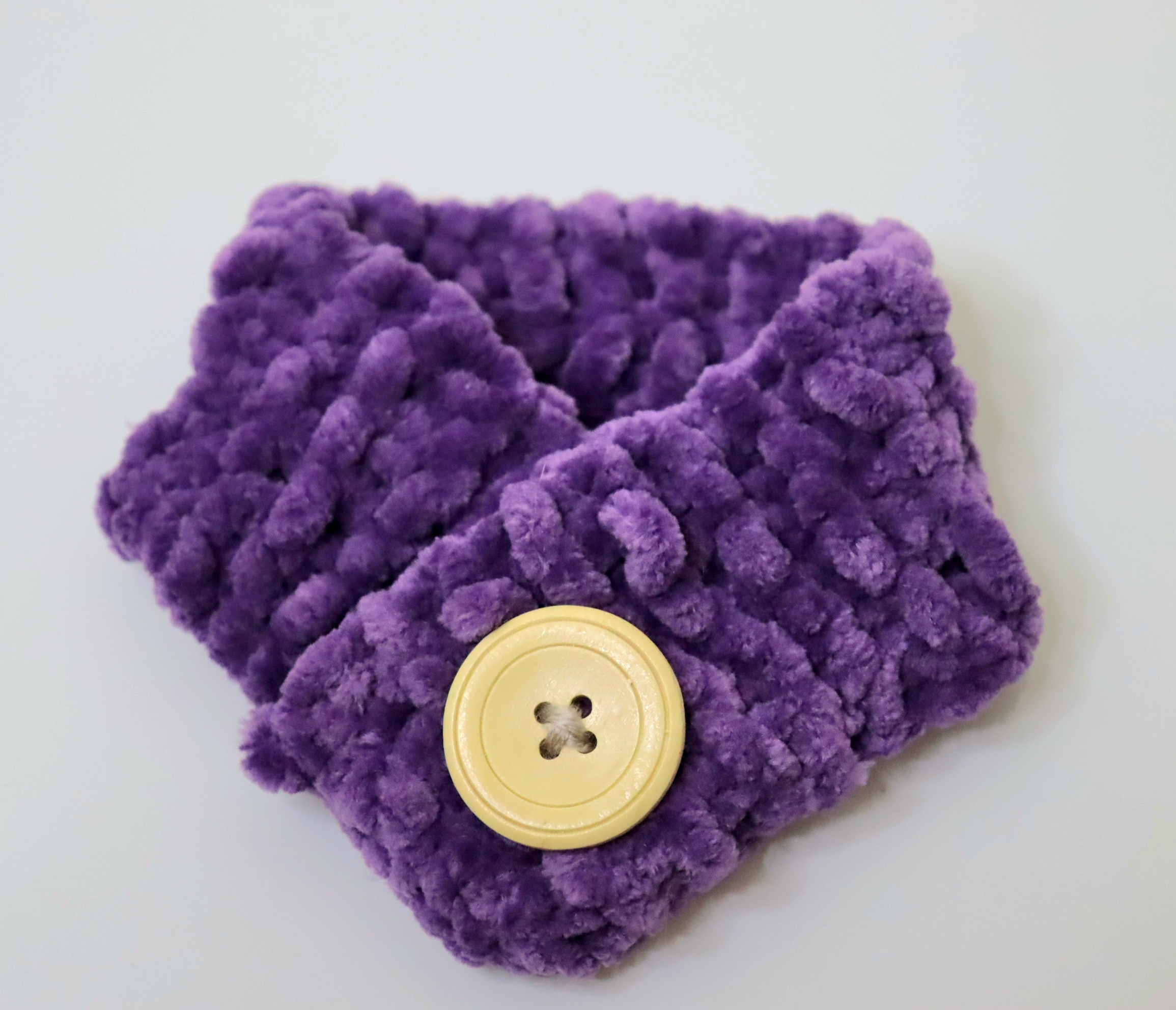 Photo of a purple knitted scarf
